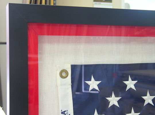 Signed sports jersey with team photos