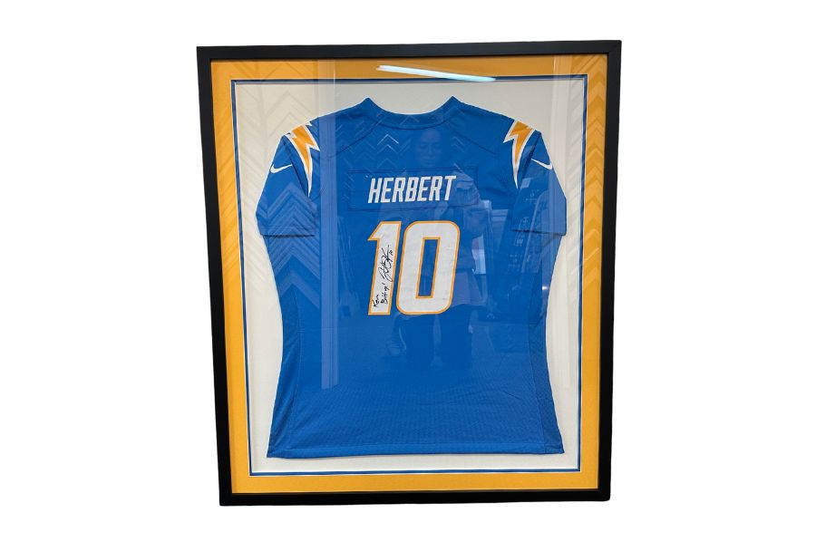Custom sports shadow box — Style 02, clean modern frame with museum matting